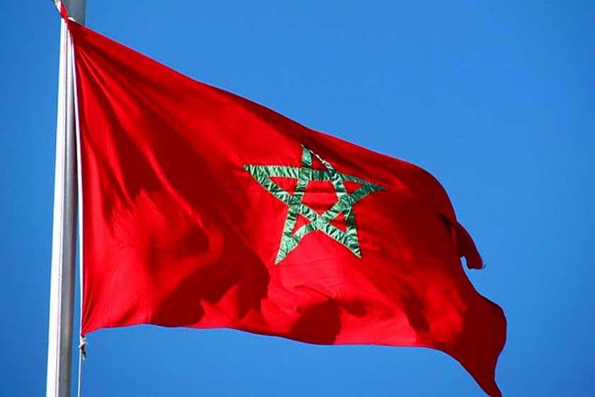 شادی بازیکن مراکش پس از صعود به مرحله بعد با پرچم فلسطین